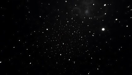 Abstract black background with small floating white particles resembling stars, dust, or snowflakes.