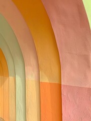 Poster - The colors, from top to bottom, are orange, pink, and light green, representing a fun and playful composition