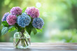 © Галя Дорожинська - Vibrant hydrangea bouquet in a glass vase on a wooden table in summer. Generative AI