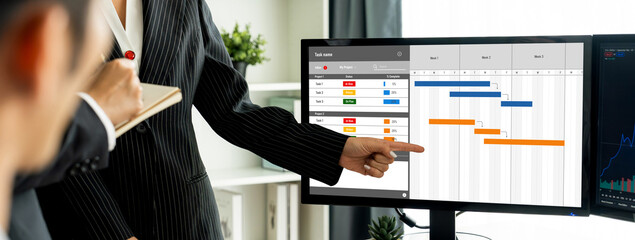 Poster - Project planning software for brisk business project management on the computer screen showing timeline chart of the team project