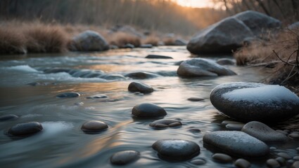 Poster - horizontal orientation color image, captured with a slow shutter speed, to depict water flowing over rocks with ice formations.