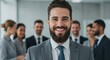 © AI Photo Stock - Successful Business Leader with Team - Confident businessman smiling, surrounded by a successful team. Represents leadership, teamwork, and achievement