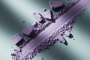 Poster - Artistic Composition of Crushed Purple Powder on Soft Green Surface Evoking Creative Vibes