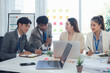 © Kritdanai - Diverse Business Team Collaboration in Office