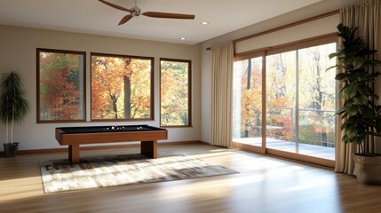 Aufkleber - Interior view of a living room with large windows overlooking a vibrant autumn forest. A pool table sits on a patterned rug with a house plant in view