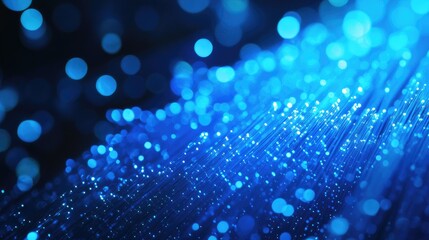Poster - A stunning, abstract image of blue fiber optic strands illuminated with light, showcasing their intricate structure and vibrant glow.