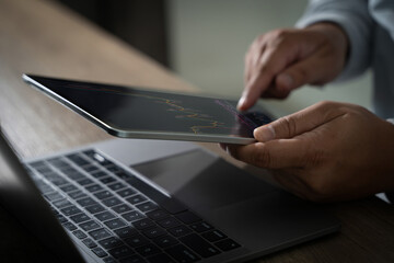 Poster - The business analyst used a laptop to analyze financial statistics, creating a digital dashboard for marketing performance reports.