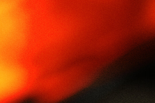 Abstract warm orange and black gradient background with noise grain overlay texture. Suitable for social media, flyers, posters, wallpapers, etc.