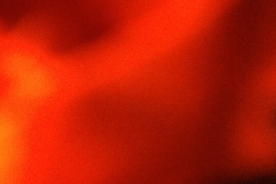 Abstract warm orange and black gradient background with noise grain overlay texture. Suitable for social media, flyers, posters, wallpapers, etc.