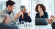 © BuyOutFelix01/peopleimages.com - Excited, business people and meeting with applause for congratulations, thank you or well done at office. Group, employees or team clapping with smile for good job, speech or promotion at workplace