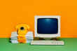 © Westend61 - Vintage 80s personal computer setup with CRT monitor and dial phone