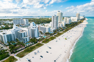 miami beach, florida – elevated aerial shows resort hotels and high-rise condominiums lining the whi