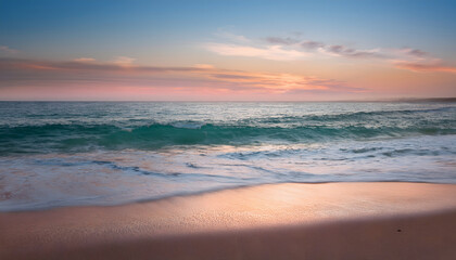 Poster - Serene beach scene at sunset with gentle waves and a colorful sky reflecting on the water