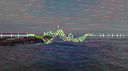 Poster - Colorful data graph animation over ocean waves and rocky shoreline