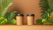 © Quang - A pair of simple coffee cups surrounded by lush green leaves against a warm background