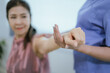© Dara-Sroi - Elderly woman receives physical therapy at home with assistance from a physician in exercise.