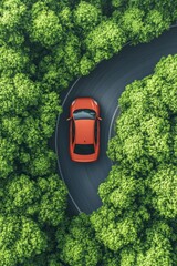 Poster - Aerial view of a vibrant orange car driving on a winding asphalt road surrounded by lush green trees in a forest setting