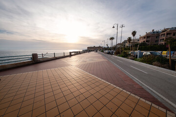 springtime sunset over the ligurian sea, taken from one sea promenade at the eastern neighborhoods o