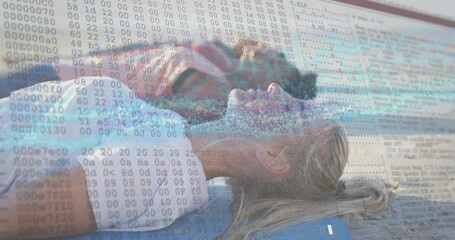 Poster - On beach, couple relaxing with digital animation overlaying scenic view