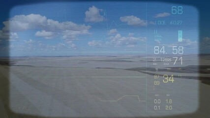 Poster - Animation of digital data overlaying desert landscape with blue sky and clouds