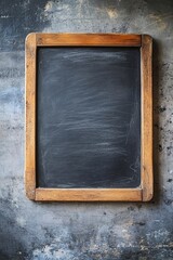Poster - Empty vintage chalkboard hanging on a textured wall background