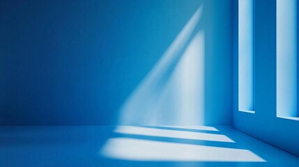 Leinwandbilder - Sunlight casting geometric shadows in a minimalist blue room
