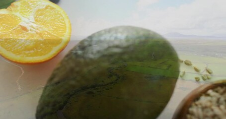 Poster - Avocado and orange with grains and seeds, creating healthy food animation