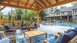 © Pannee - A poolside pavilion with wooden furniture, bright-colored seating, and natural fiber rugs.