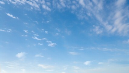 Wall Mural - light blue vault of heaven, filmy clouds wandering. the light blue sky is pure and vast. a few filmy