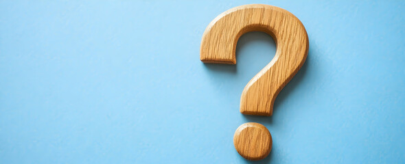 Poster - Photo of a question mark on a blue background, symbolizing the concept of matte wood grain and beige colors