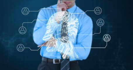 Poster - Contemplating artificial intelligence network, businessman in blue shirt in office setting