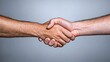 © yusufadi - A Firm Handshake: Symbol of Agreement, Trust, and Collaboration