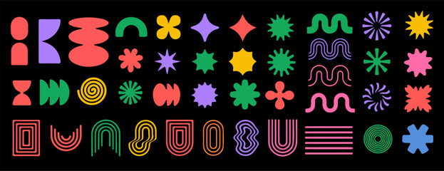 Fototapete - Vibrant collection of abstract geometric shapes in bright colors against a black background, including stars, spirals, and curves, arranged in a playful, modern grid pattern.
