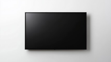 Flat-screen television mounted on a white wall.