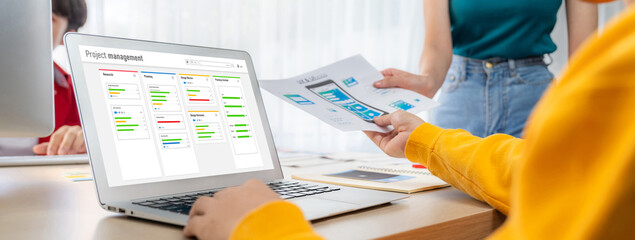 Fototapete - project planning software for brisk business project management on the computer screen showing timel