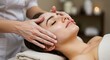 © LittleDuck - Relaxing Facial Treatment - Woman receiving a soothing facial massage with a creamy mask. Spa treatment for healthy skin
