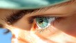 © Haya - Mans Blue Eye Closeup with Sunny Day.