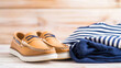 © sabyna75 - Nautical vibes 2025: classic boat shoes and striped nautical fashion ensemble