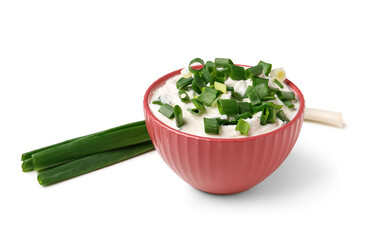 Wall Mural - bowl of tasty sour cream with green onion on white background