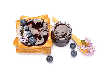 Wall Mural - jar of sweet jam, delicious toasts, blueberries and lilac flowers isolated on white background