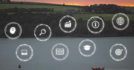 Poster - Animation of digital icons overlaying serene lake and countryside at sunset