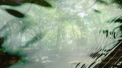Poster - Animation of green abstract shapes blending over serene forest landscape background