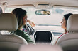 © SHOTPRIME STUDIO - Young couple enjoying a conversation inside a car, with a focus on their expressions, capturing intimacy and connection in a relaxed setting