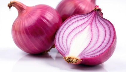 Wall Mural - Close-up of red onion, showing layers and texture, white backdrop , cut, vibrant, white background