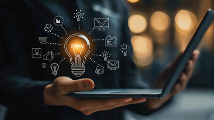 Aufkleber - person holding laptop with glowing light bulb and various icons representing ideas and communication. image conveys innovation and creativity in technology