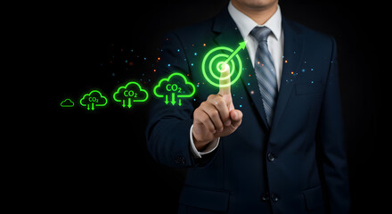 Poster - Business Man Touching Green Target Symbol Displaying Cloud Computing and Data Transfer on Black Background