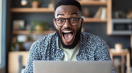 Aufkleber - Shocked young man working from home having good news on laptop