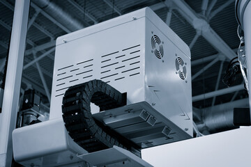 Aufkleber - A machine with a fan on top of it.