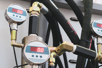 Aufkleber - Bundle of pipes connected to industrial hydraulic pneumatic machine, industrial concept background