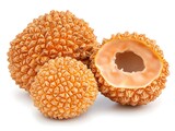 Three ripe, golden-yellow salak fruits are displayed on a white background one is cut open revealing its sweet orange flesh.